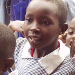 Anticipation on the face of a young kenyan student for World teacher aid donations