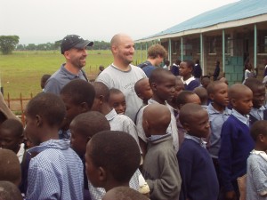 Scott and Garrett of Trust Guard wait to pass out donations in Kenya