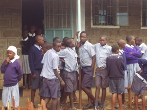Kenyan students awaiting world teacher aid donations