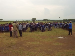 Kenyan classes lining up before the donation from world teacher aid