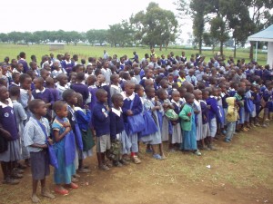 Happy Kenyan students after getting donated items and school supplies from World Teacher Aid