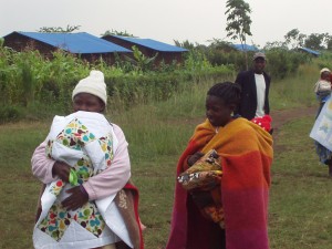 Kenyan Women receiving quilts from World Teacher Aid Donors