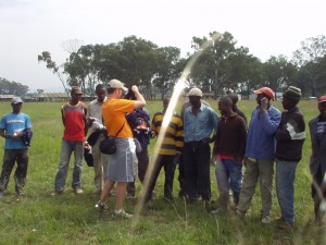 Handing out more Solvay Concert band t-shirts to Kenyan work crew