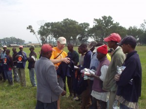 Handing out even more Solvay Concert band t-shirts to Kenyan work crew