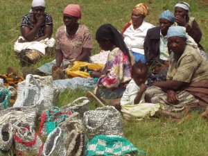 Kenyan women selling their woven grocery bag, shoulder bags